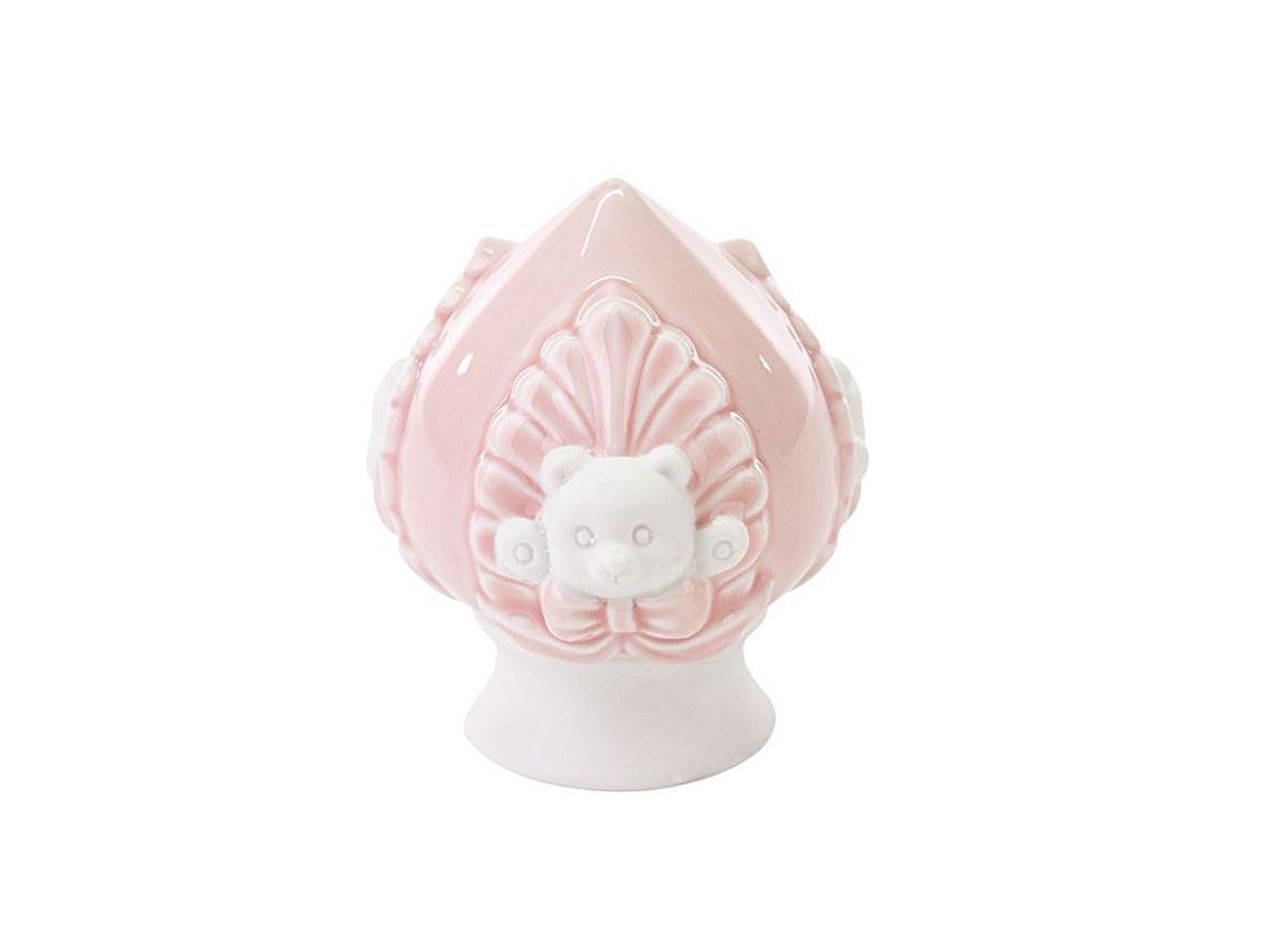 Immagine di un pumo in porcellana rosa a forma di orsetto.