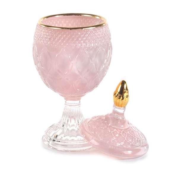 Scrigno in vetro rosa e dorato con lavorazione a rilievo, ideale per bomboniera o oggetto d'arredo.